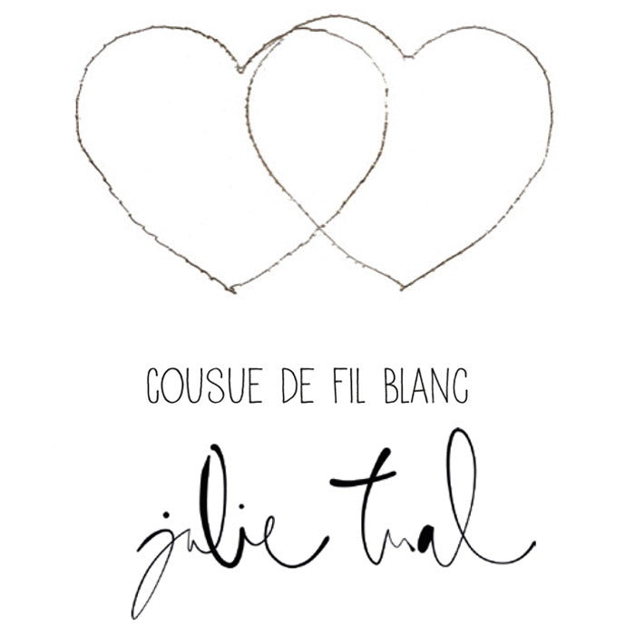 Cousue de fil blanc