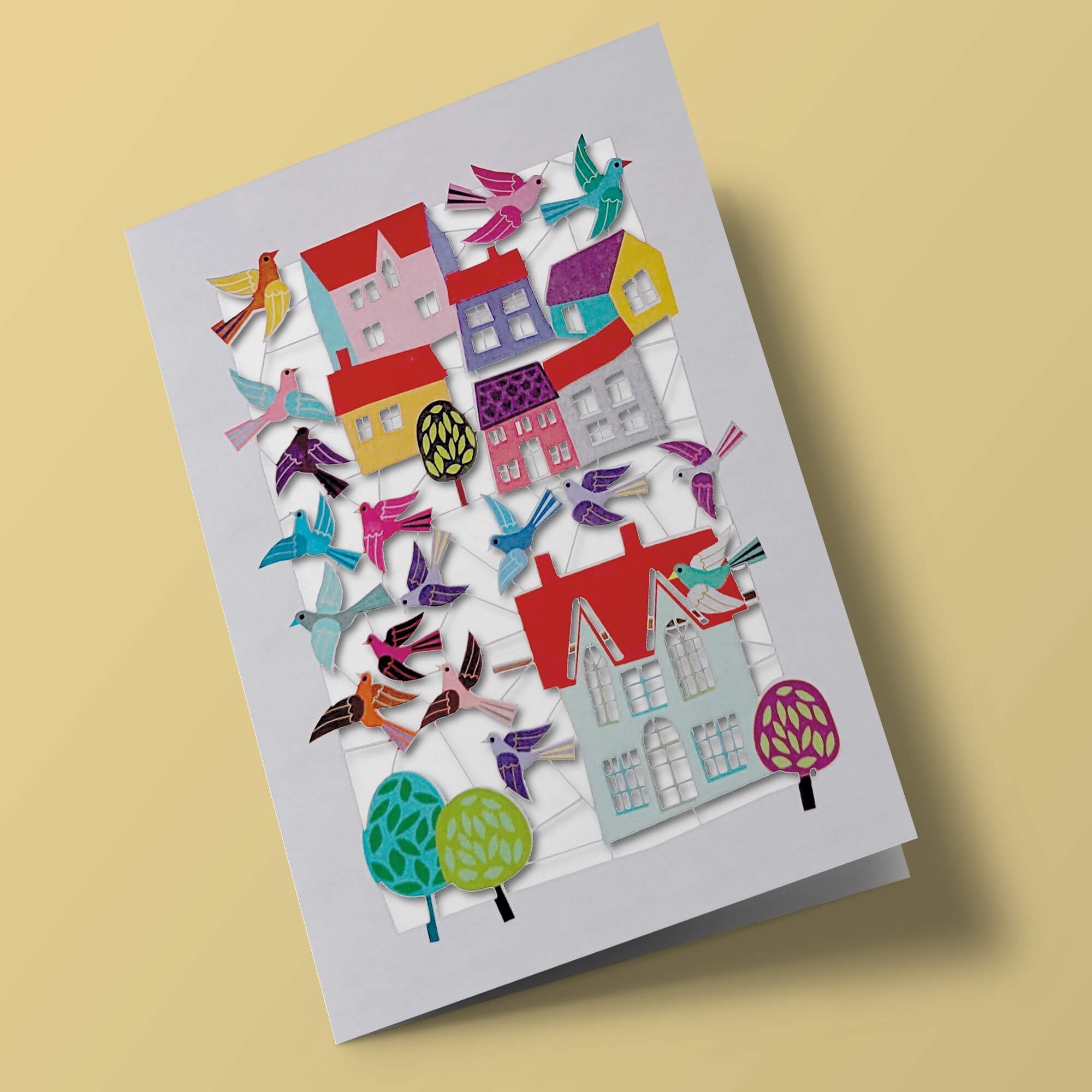 Carte découpée - Oiseaux et maisons