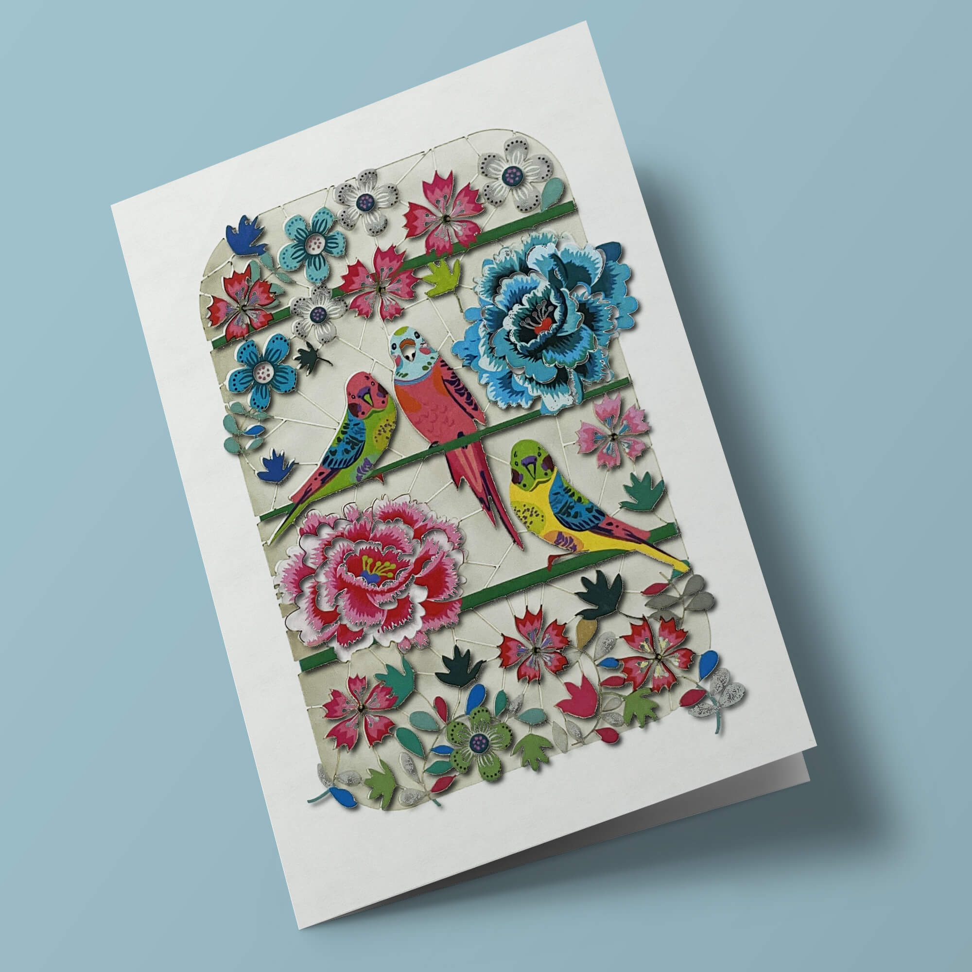 Carte découpée - Perruches et fleurs