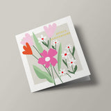 Meadow - Marguerites et fleurs roses sur fond gris, joyeux anniversaire