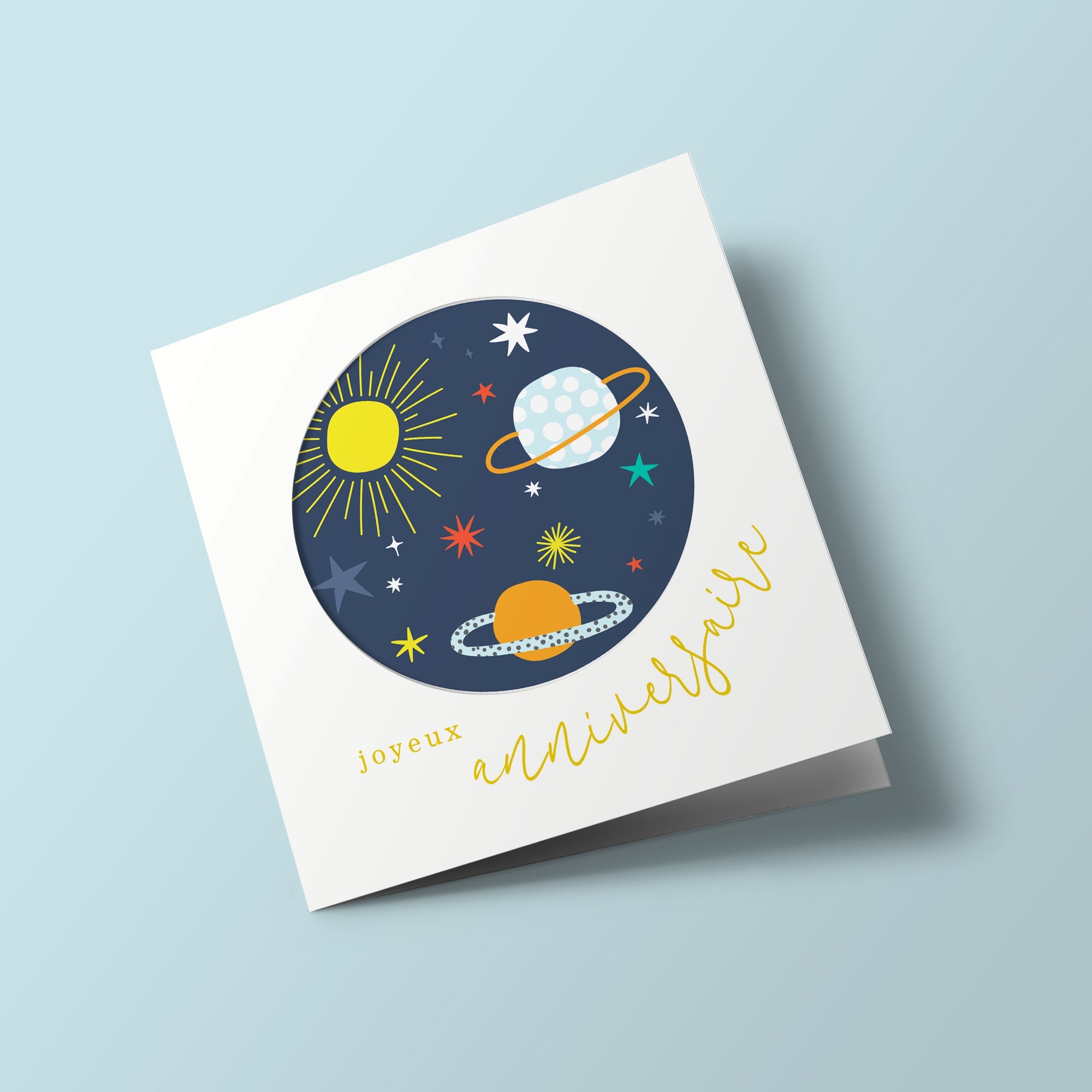 Let's Celebrate - planets in a dark circle, on a light background