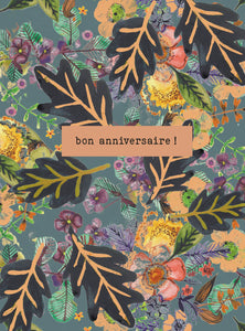Say it with flowers - Bon anniversaire - black leaves and yellow flowers